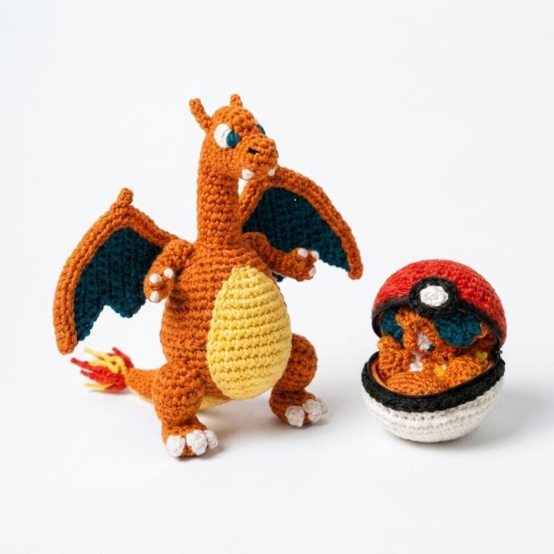 Front view of handmade orange Charizard-inspired crochet amigurumi