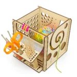 Wooden crochet and knitting organizer box with colorful yarn, scissors, crochet hooks, and bamboo needles — perfect for crafters and yarn storage.