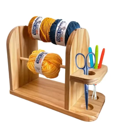 Wooden yarn holder stand for crochet with scissors and colorful hooks — perfect for organizing yarn and tools for amigurumi projects