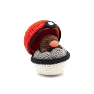 Diglett reversible crochet pattern — the ball unzipped with Diglett folded inside