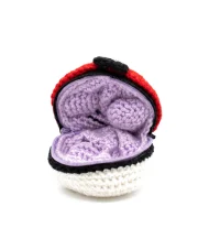 Ditto reversible crochet pattern — the ball unzipped with Ditto folded inside