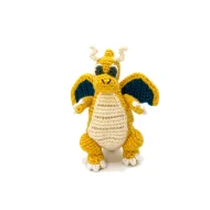 Dragonite reversible crochet pattern — the finished Dragonite amigurumi standing alone on a white background