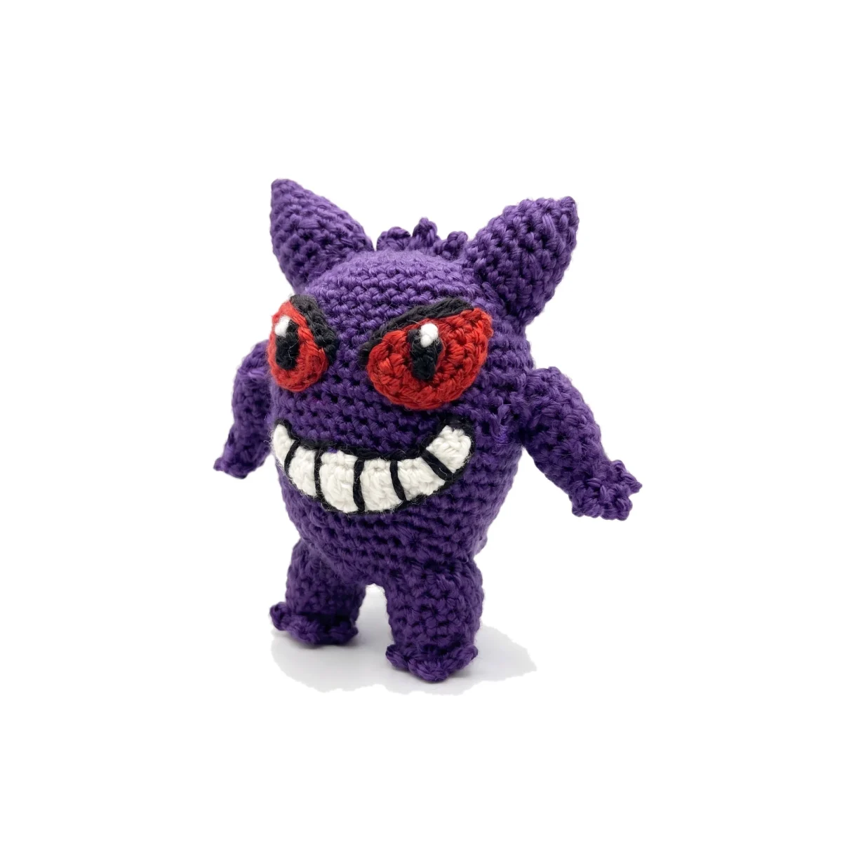 Gengar reversible crochet pattern — a left side view of the Gengar amigurumi