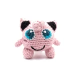 Jigglypuff reversible crochet pattern — the finished Jigglypuff amigurumi standing alone on a white background