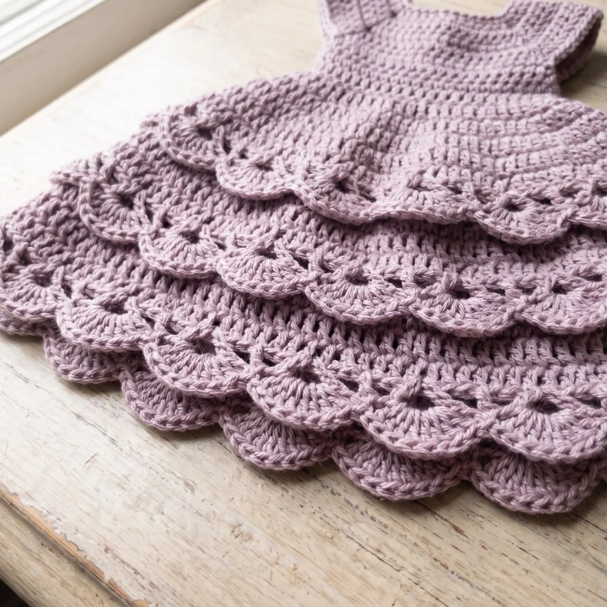Lace skirt detail of the crochet angel ornament pattern, four tiers of shell edging