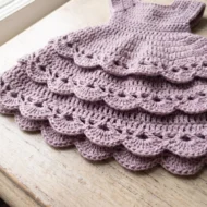 Lace skirt detail of the crochet angel ornament pattern, four tiers of shell edging