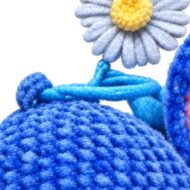 keyring chain and crochet head texture close-up from the crochet blue alien pattern amigurumi