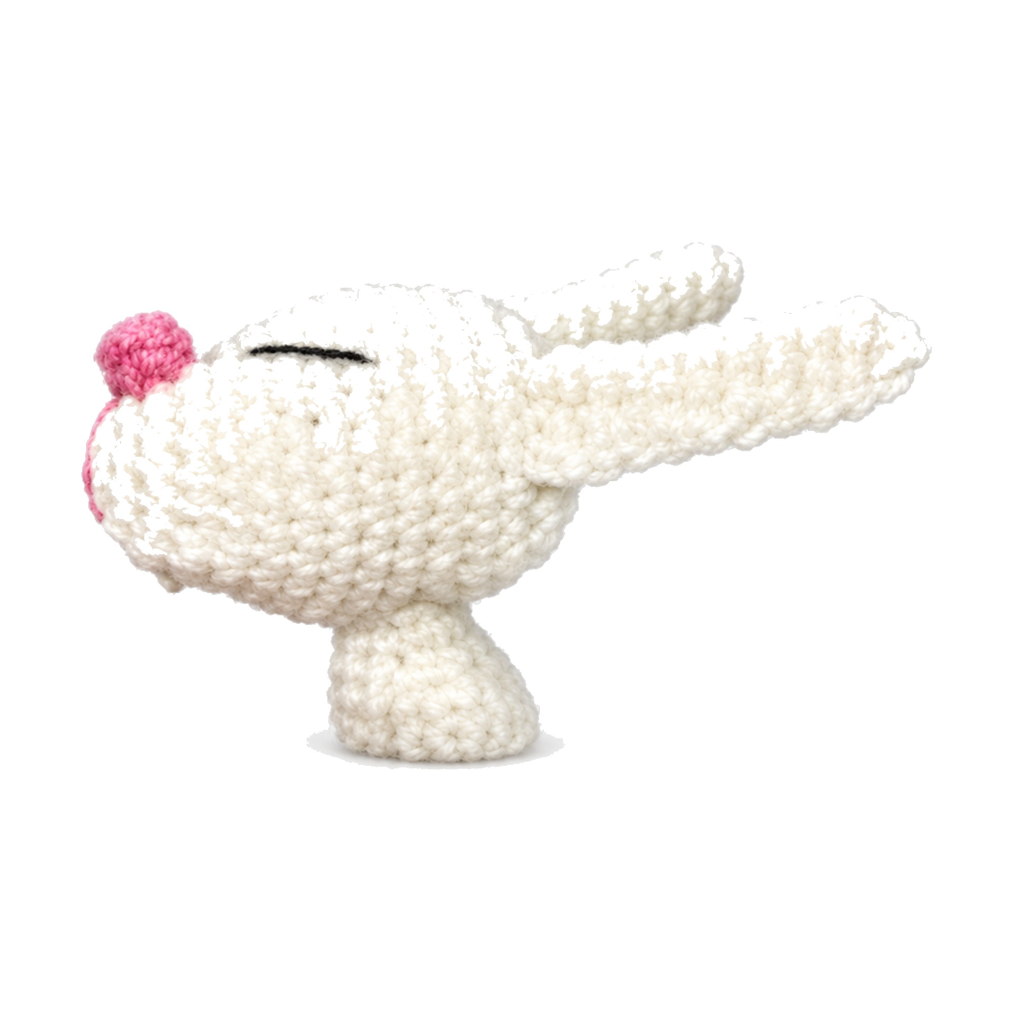The sleepy-eyed amigurumi bunny from the crochet bunnies on sled pattern, with a cinched pink nose