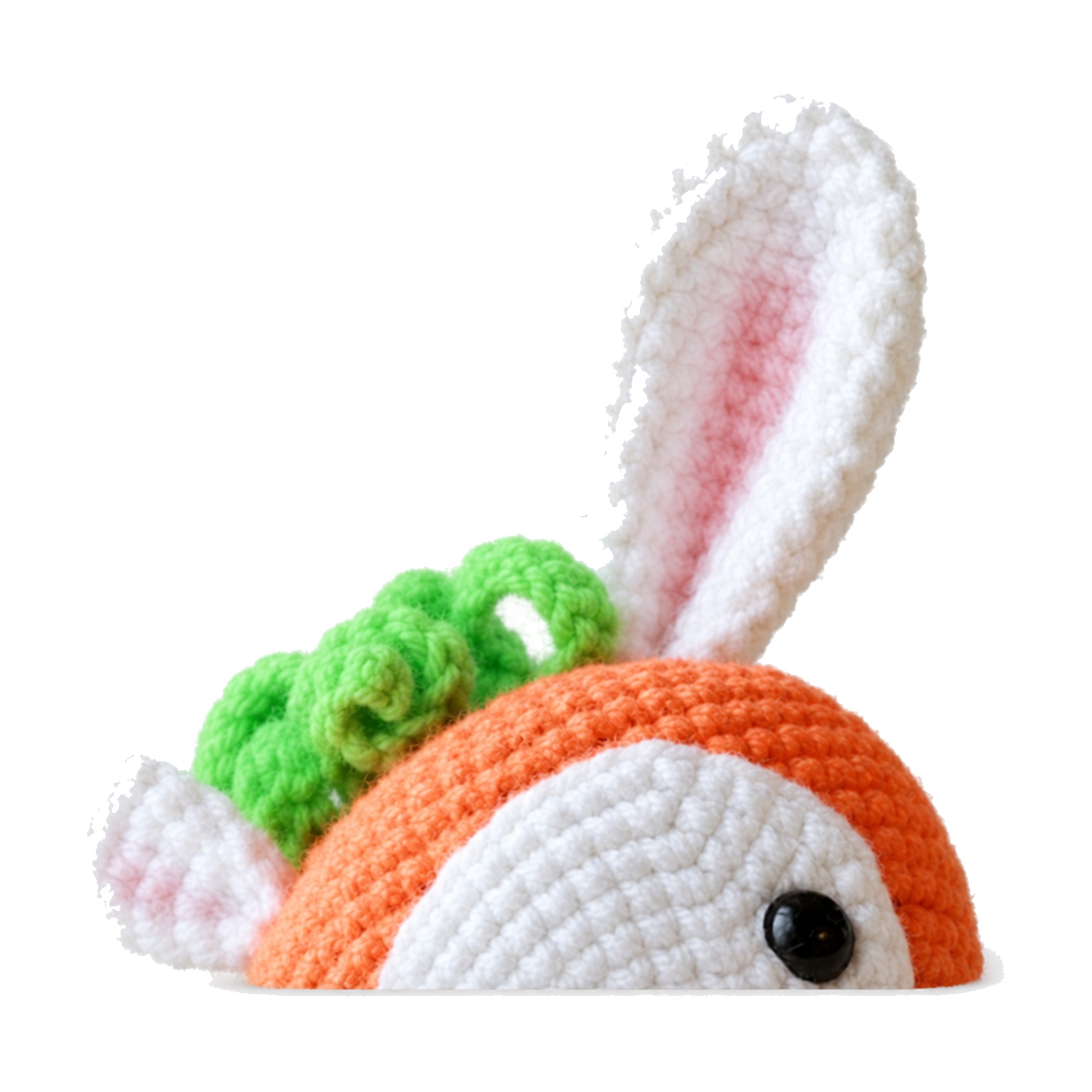 Top-down detail of the crochet bunny carrot pattern toy showing the six-loop green leaf tuft and white floppy ear