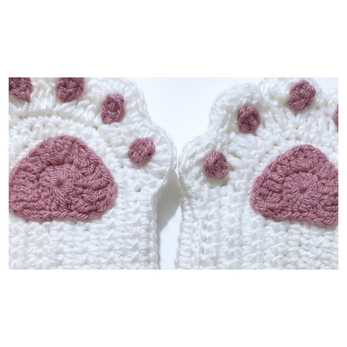 Close detail of the paw pad and toe pads from the crochet cat paw gloves pattern