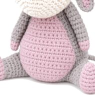 The pink belly panel on the crochet donkey pattern, with the grey arms and legs around it