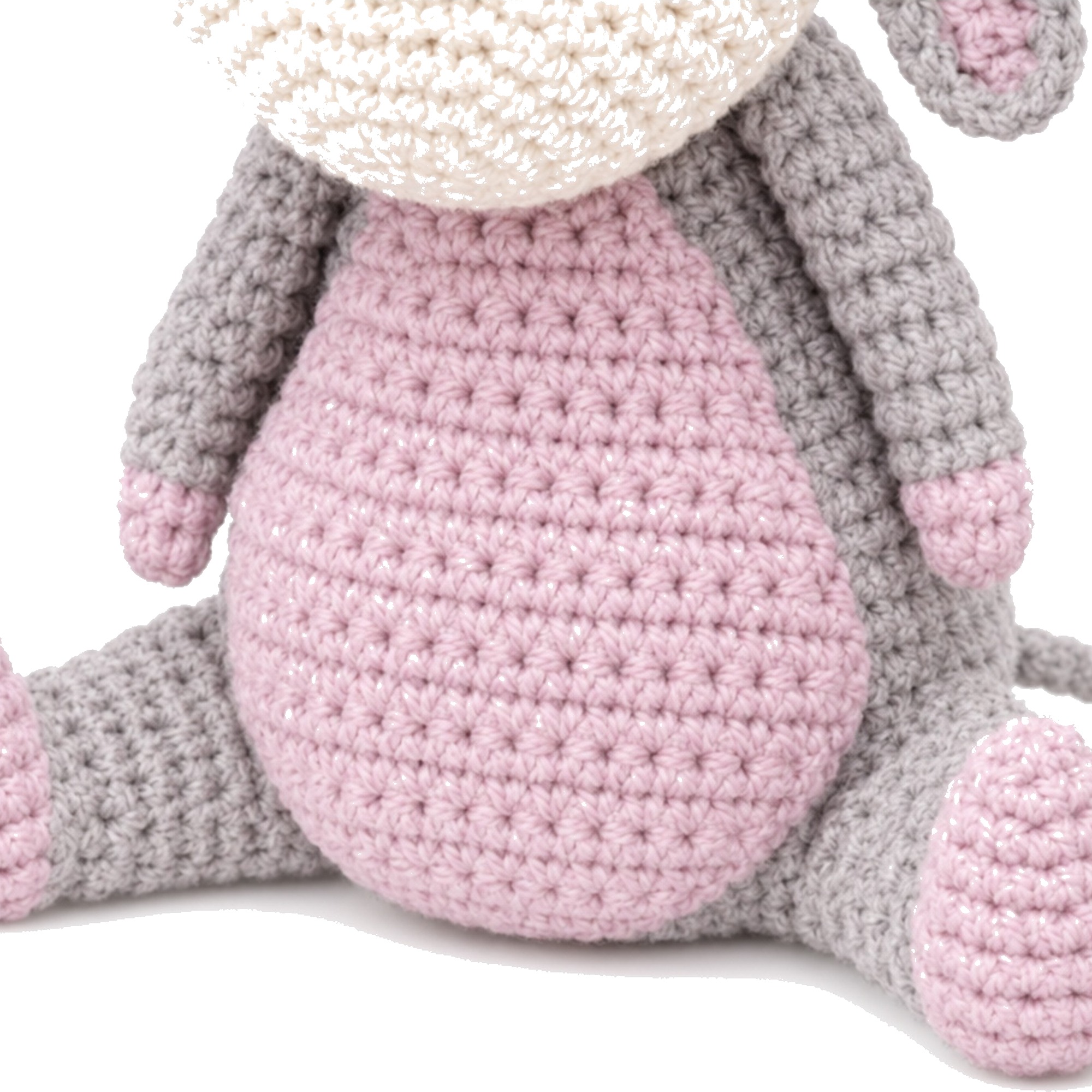 The pink belly panel on the crochet donkey pattern, with the grey arms and legs around it