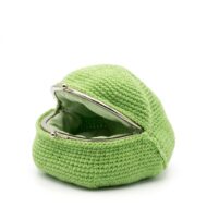 The crochet frog purse pattern with its mouth wide open on the metal purse frame