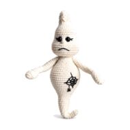 Crochet ghost pattern amigurumi frowning with an embroidered spiderweb belly