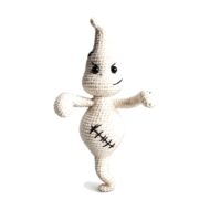 Crochet ghost pattern amigurumi smirking with a stitched-scar belly