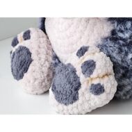 The feet and grey paw pads of the crochet hedgehog pattern