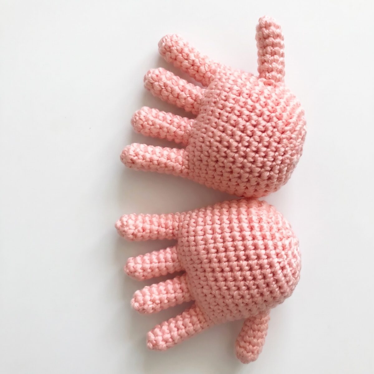 Both legs with their five-toed feet from the crochet monkey pattern